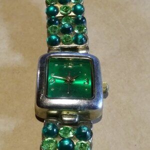 Secret Treasures ladies green faux jeweled watch, untested